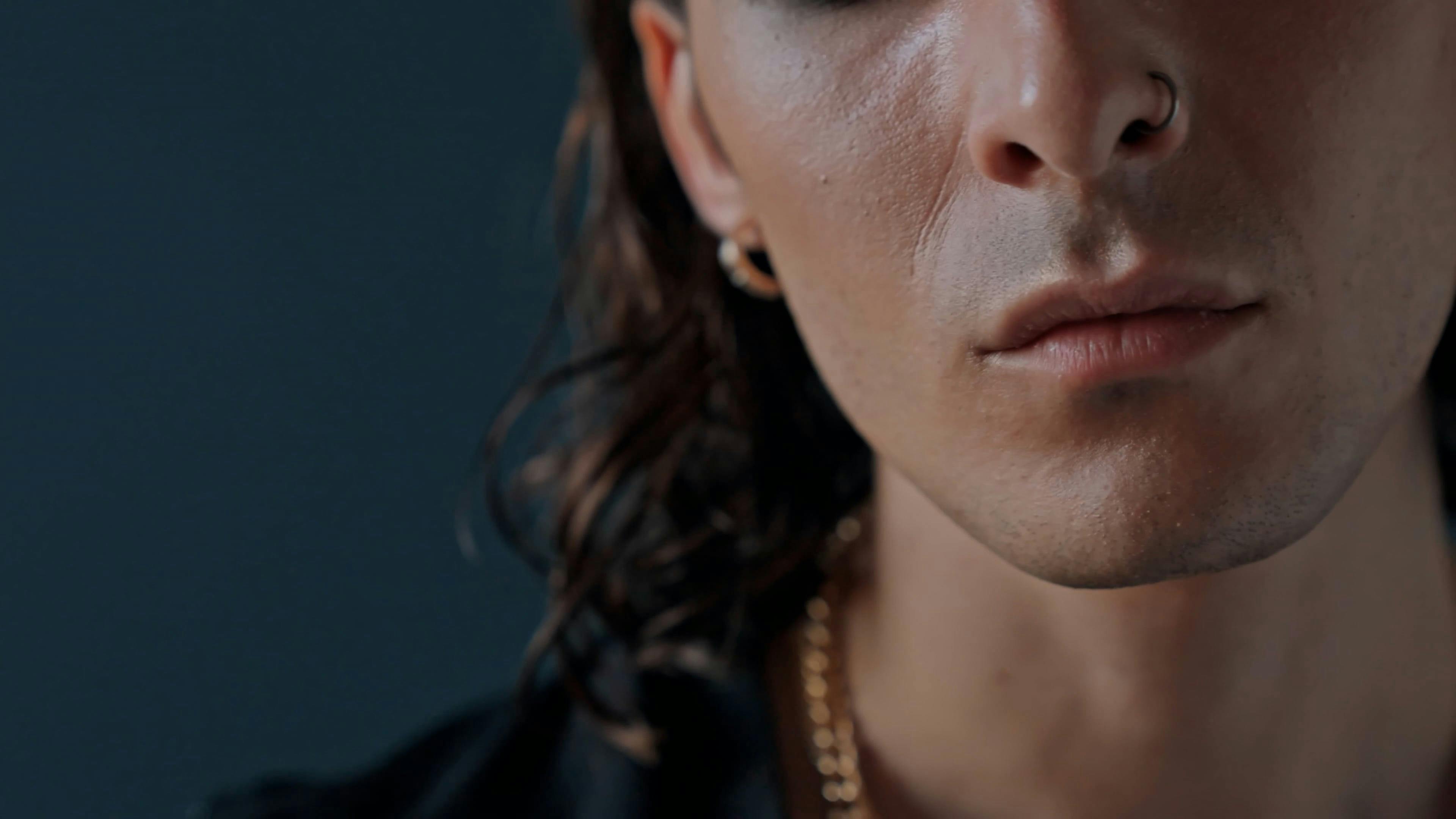 Closeup of man blowing flame of lighter Free Stock Video Footage, RoyaltyFree 4K & HD Video Clip