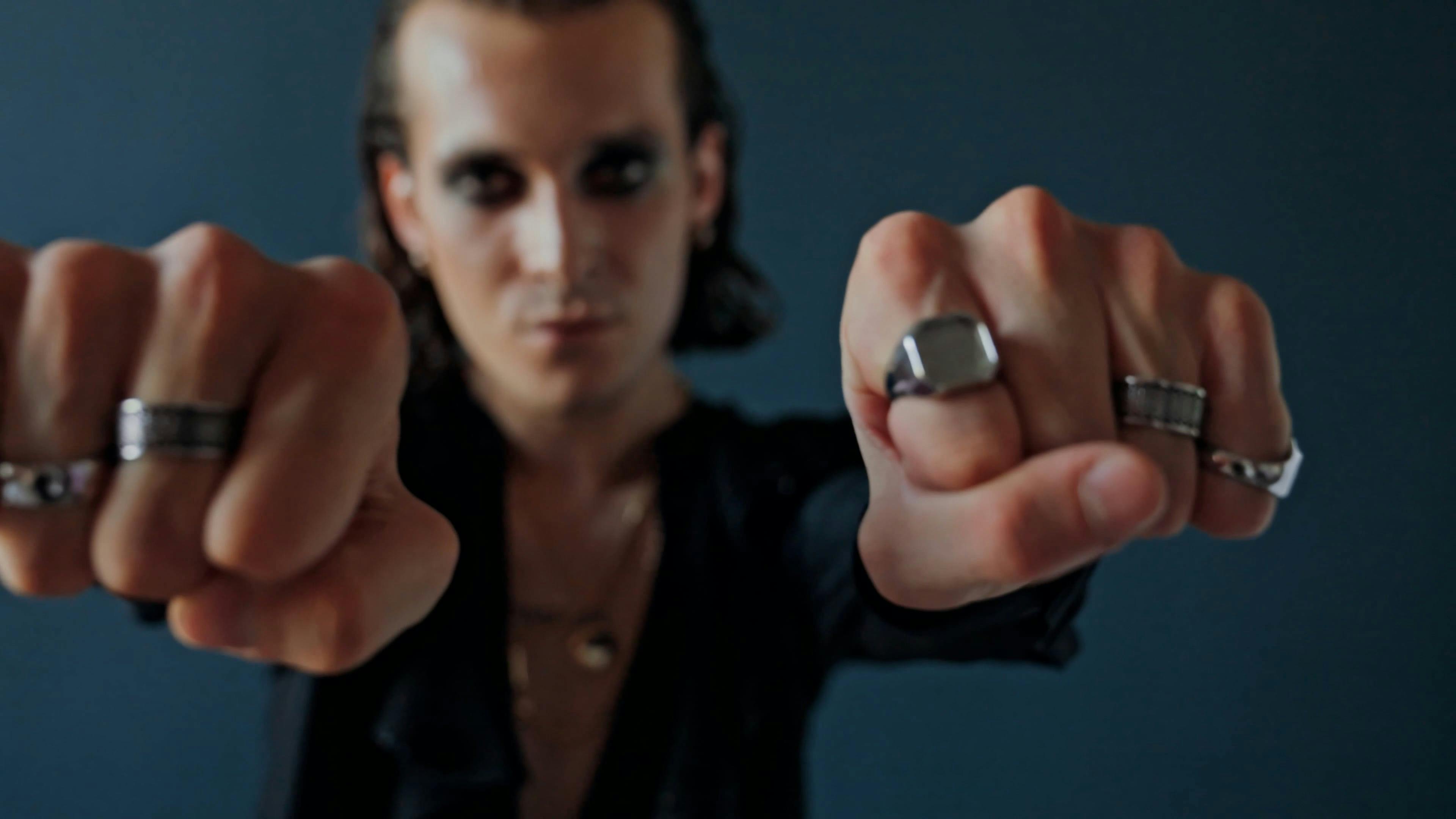 Male model showing rings on fingers and smiling Free Stock Video Footage, RoyaltyFree 4K & HD