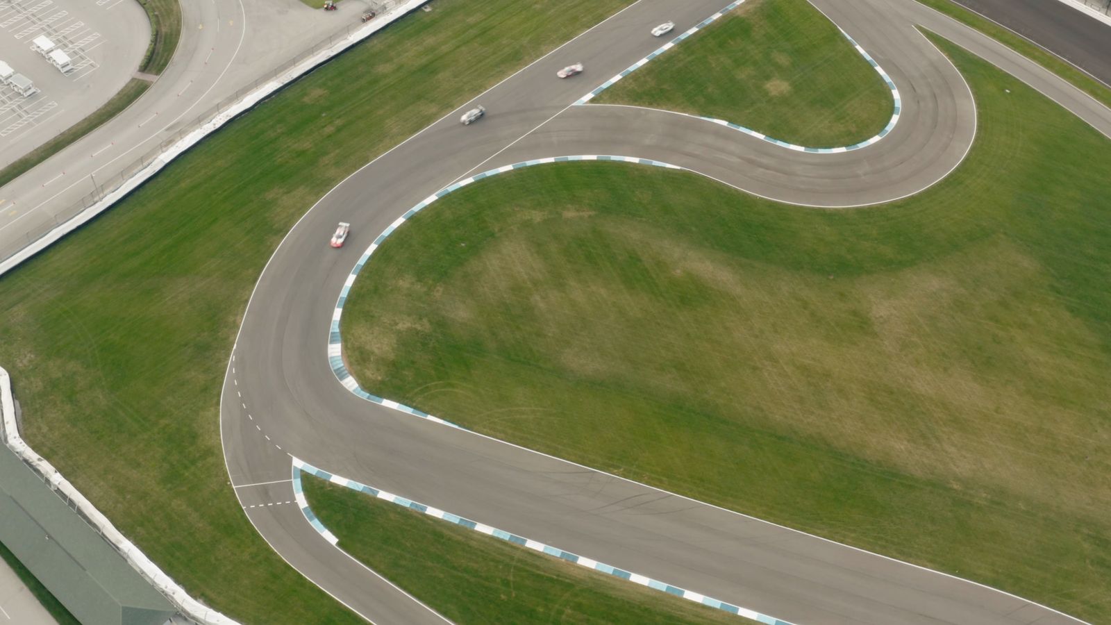 Real Car Racing Track Drone shot of race cars racing on track Free Stock Video Footage ...