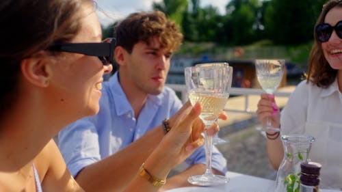 People Toasting their Glasses of Champagne