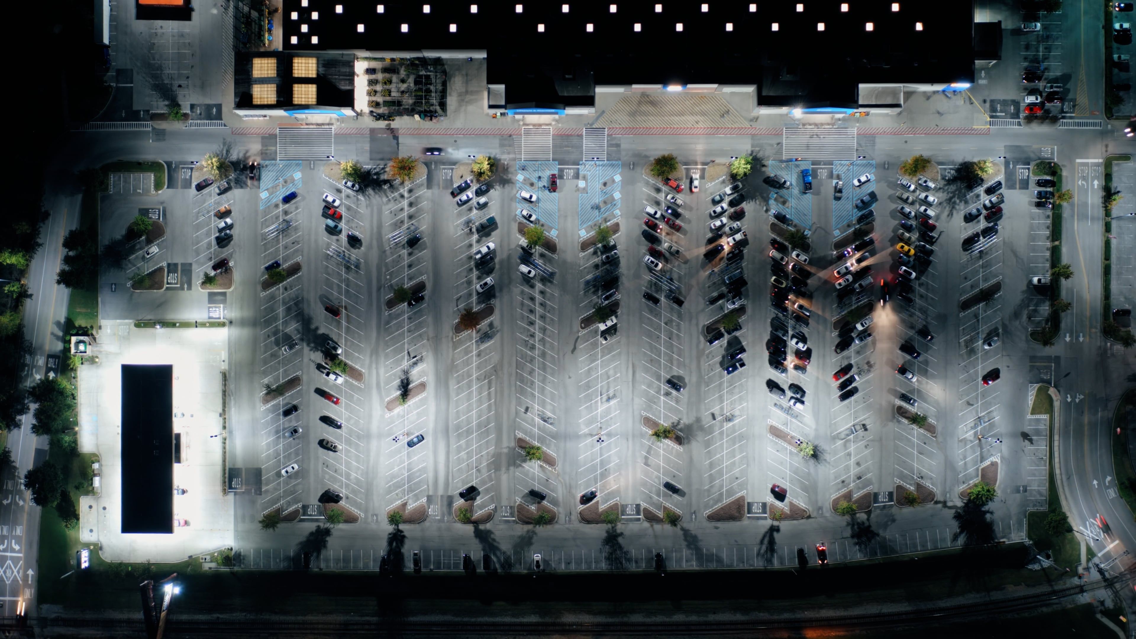 Aerial Footage Of A Parking Lot During Night Time Free Stock Video