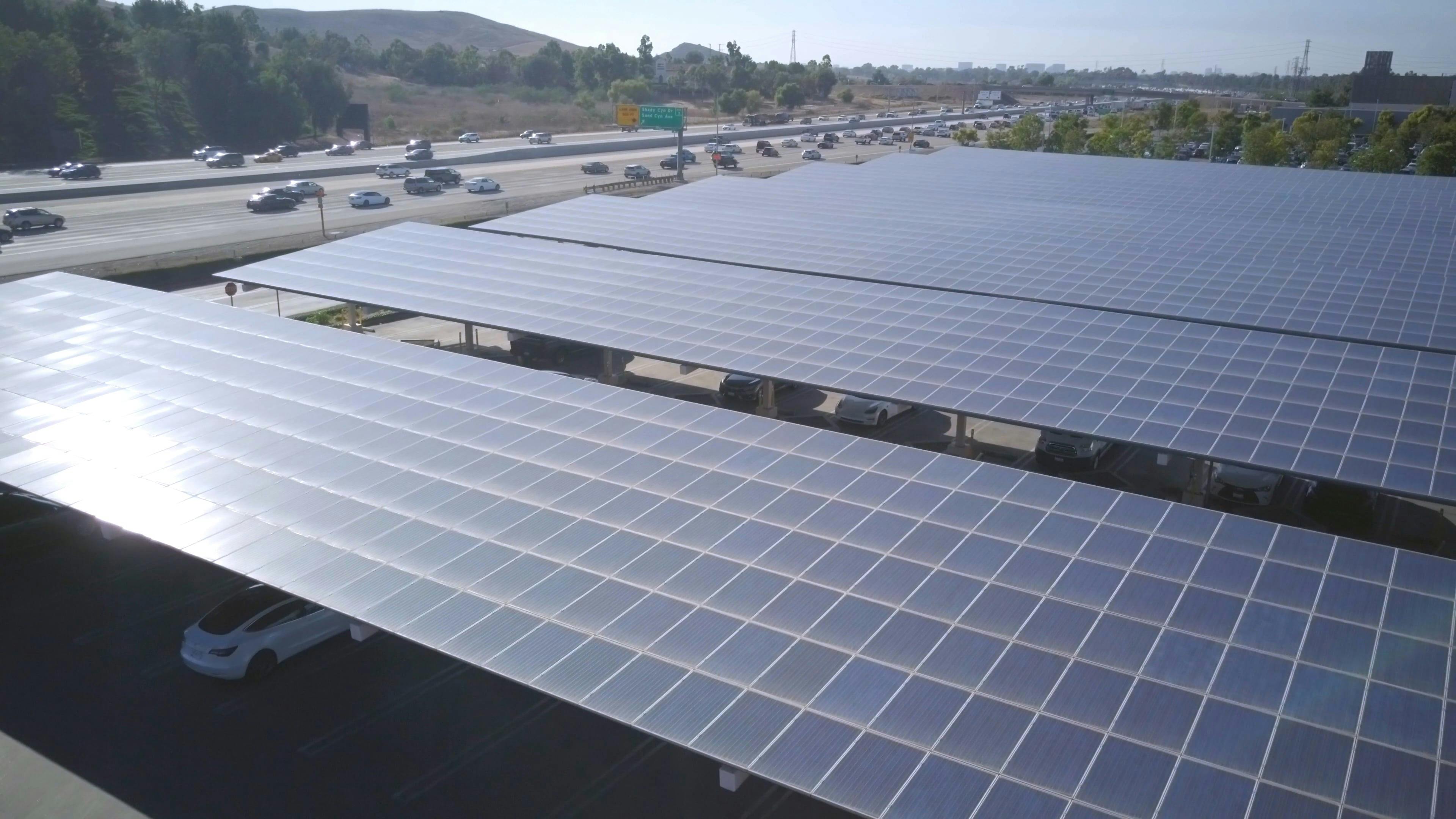 Aerial View of a Solar Panel Parking Lot · Free Stock Video