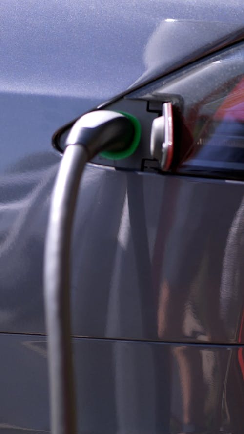 Close up of an Electric Car at a Charging Station 