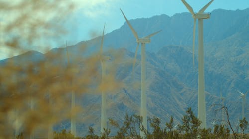 Wind Turbines Near the Mountains 