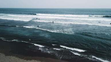 surfers at the beach