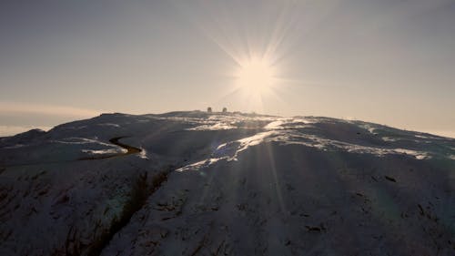 Beautiful Footage of Sun From a Snow Capped Mountain