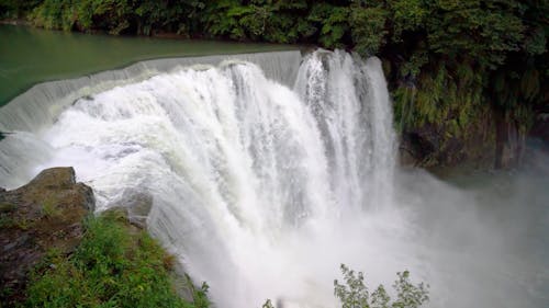 Footage of Landscape with Large Waterfall