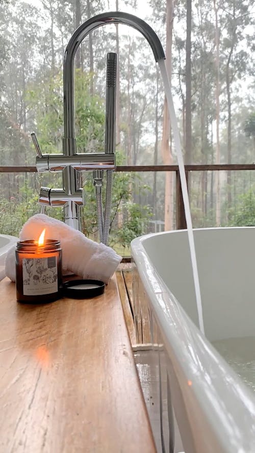 Time Lapse of a Faucet Filling a Tub with Hot Water