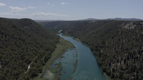 Drone Footage of Blue River and Hills