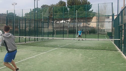 Men Playing Tennis At Daylight