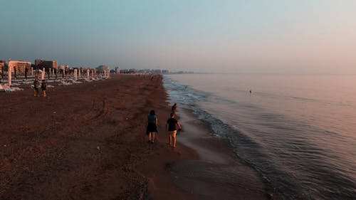 A Drone Footage of People at the Beach