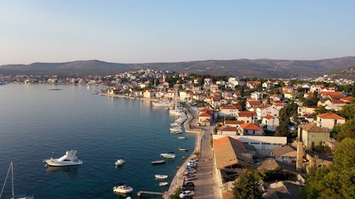 Drone Shot of Boats in Harbor and Town