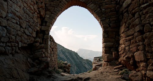 Arch in Old Ruin in Mountains