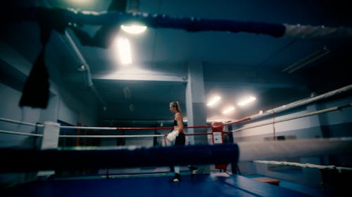 A Boxer Shadowboxing in the Boxing Ring 