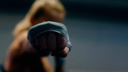 A Person Doing a Punching Position Slowly
