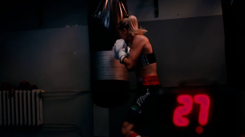 A Boxer Punching a Heavy Bag 