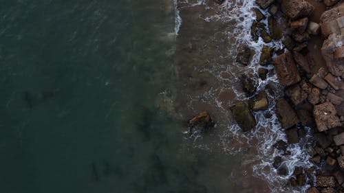 Rocky Coastline and Sea From Above