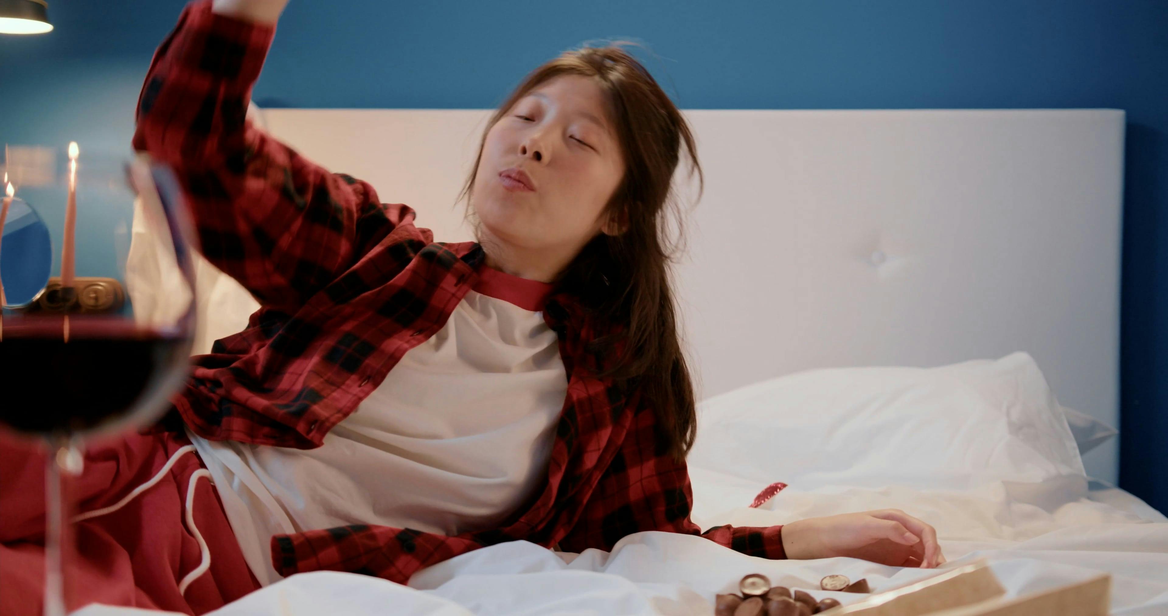 A Woman Eating Chocolate and Drinking Wine Free Stock Video Footage